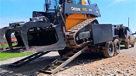 how to load skid steer onto a box truck|trailer skid steer loading.